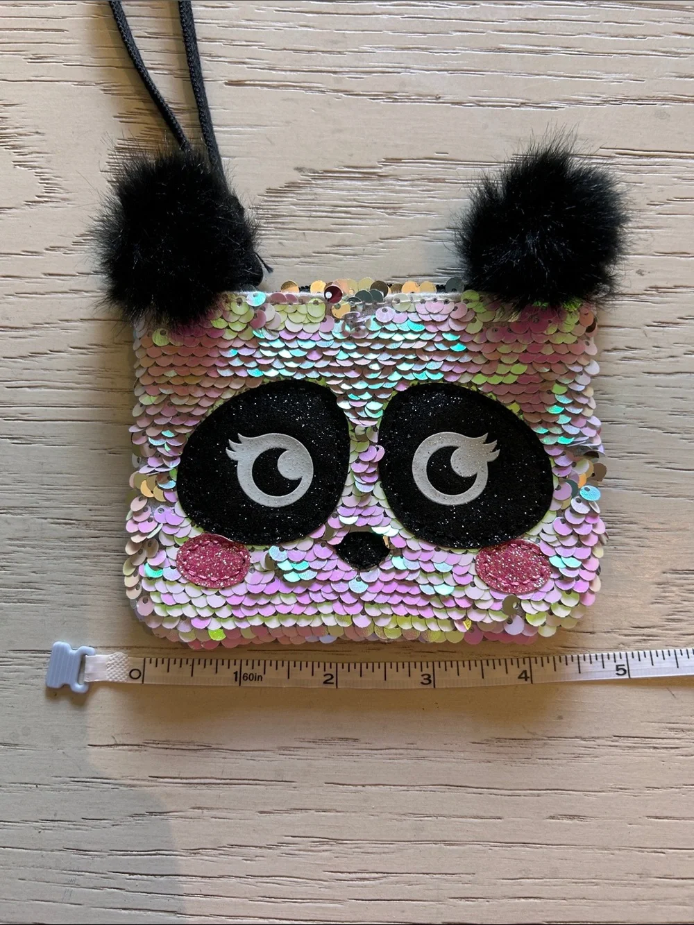 Justice Iridescent Sequin Panda Wristlet with Black Pom Poms